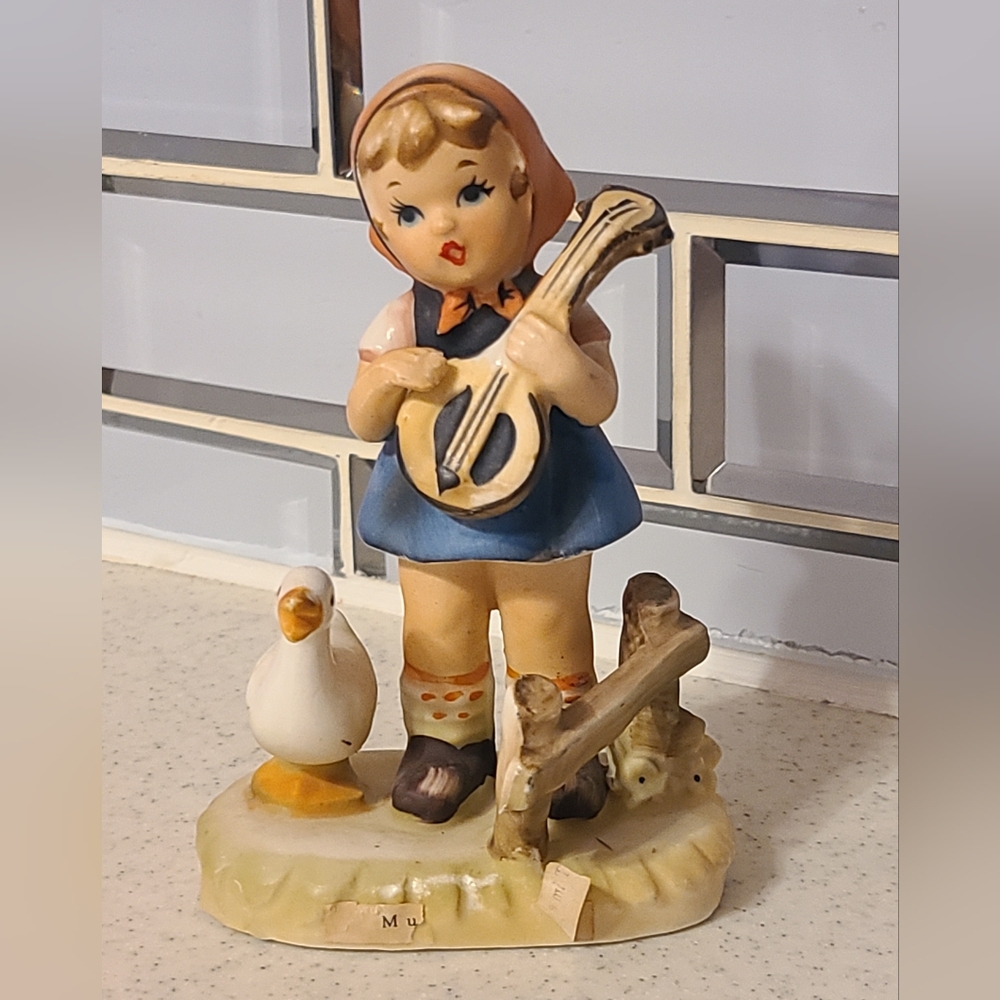 Vintage Figurine with Girl and Goose Collectors Items